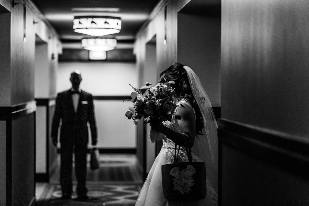 black and white bride and her father first look