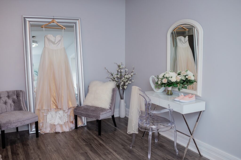 cellar 52 bridal suite with bridal gown bouquet and shoes