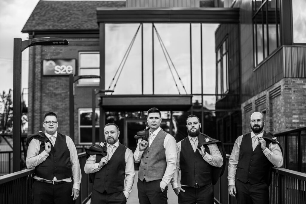 black and white portrait of groom and groomsman