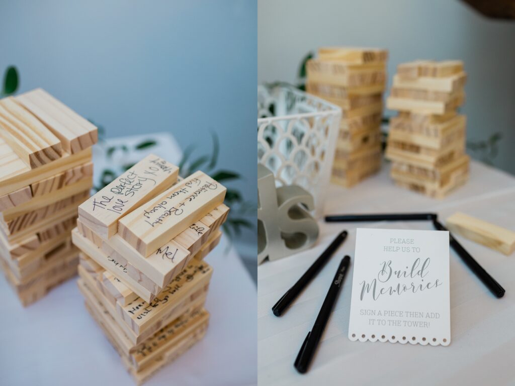 wedding guest signing on jenga pieces and puzzle