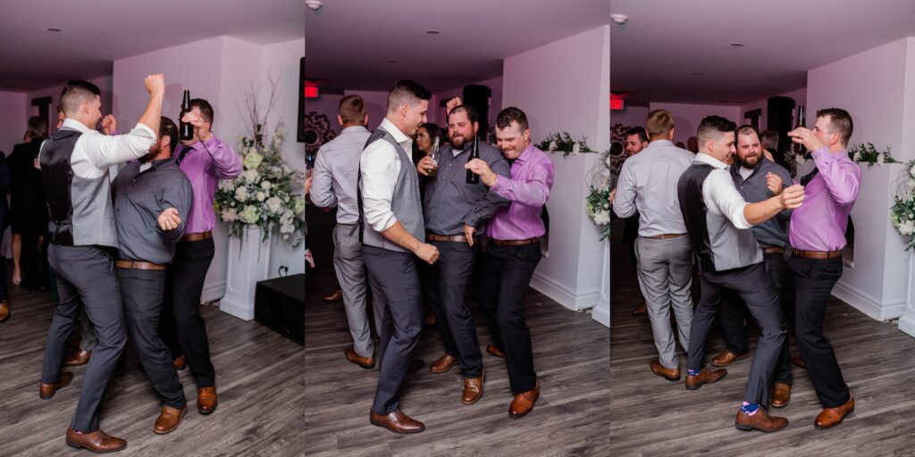 groom dancing with guests at reception