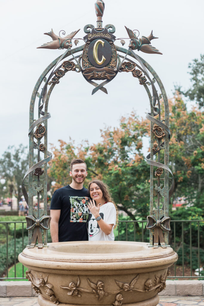 Engagement Photo of couple under arch