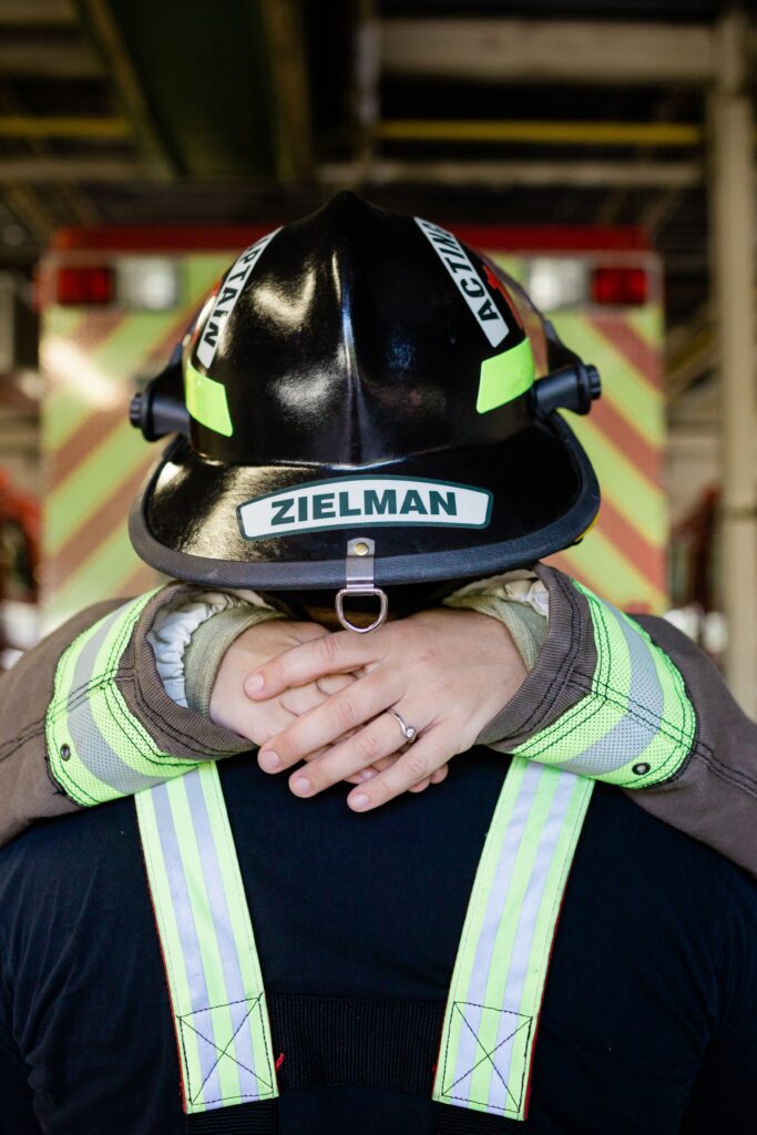 Firefighter engagement shoot with firefighter helmet