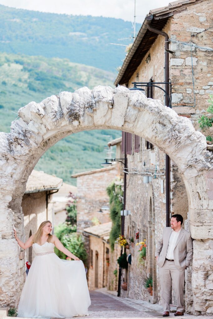 Couple under arch in Italy