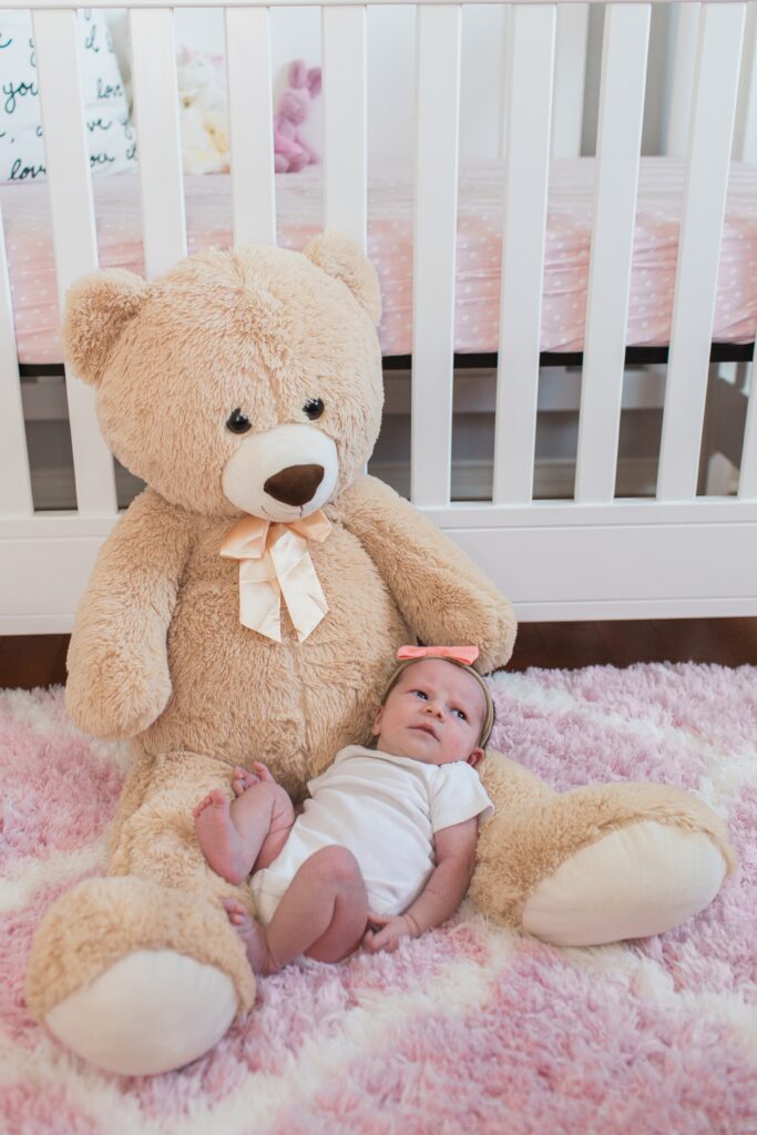 newborn in teddy bear