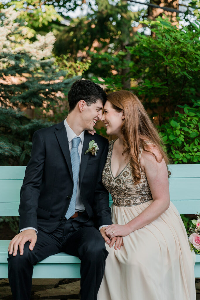 couple snuggling at their backyard elopement