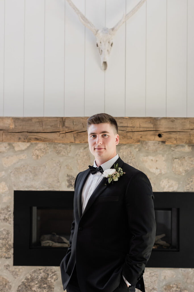 groom looking at camera with a slight smile