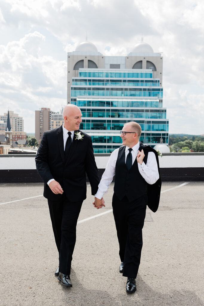 couple on rooftop in downtown Kitchener before their Walper Hotel Wedding