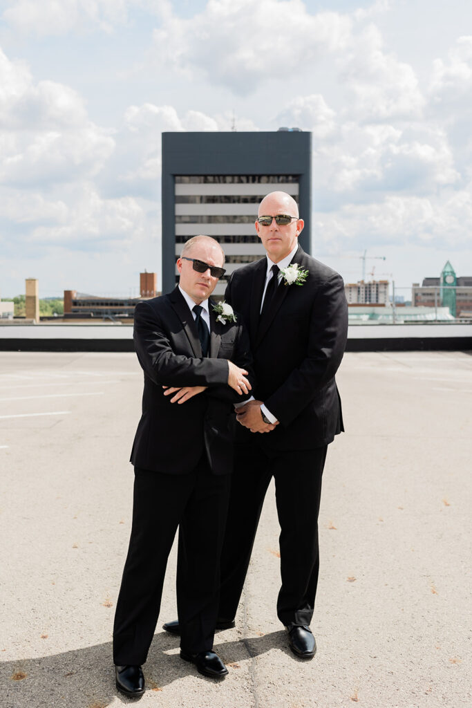 couple on rooftop in downtown Kitchener before their Walper Hotel Wedding